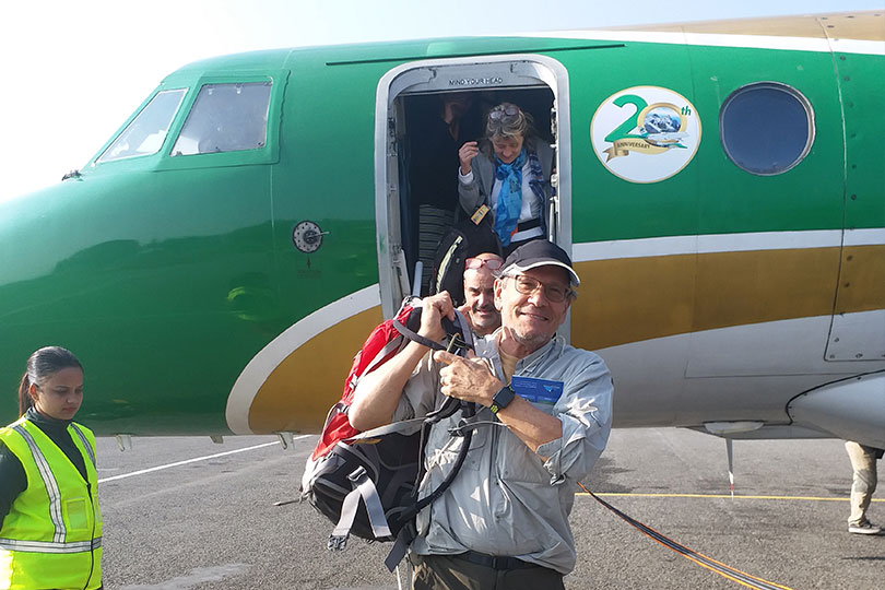 Excited travelers getting of the flight