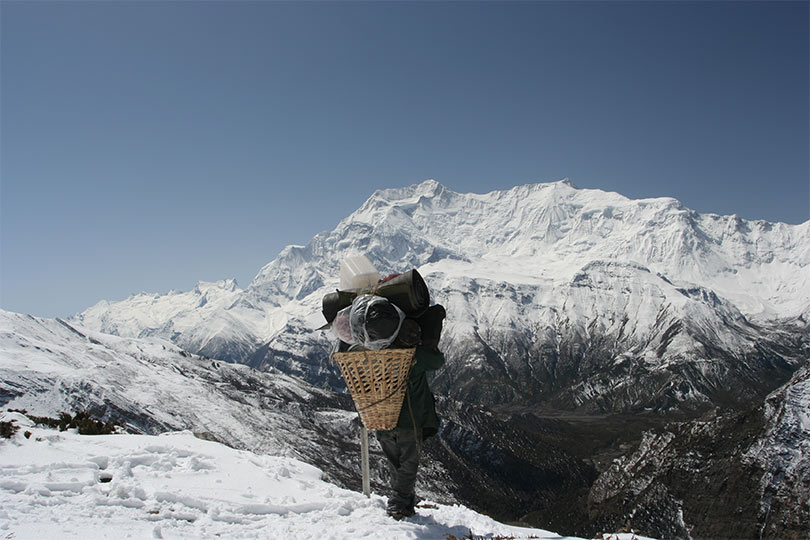 Porter in the Manaslu Trail